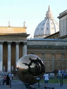 The ball in the foreground is the same size as the one on St. Peter's in the background!