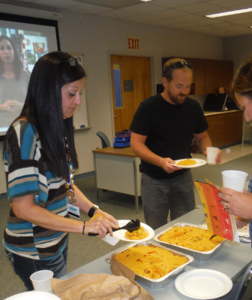 Yvette Adames & Justin Taylor serving themselves