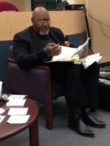 James E. Tokley, the first poet laureate of Tampa and Hillsborough County, reads from his work at the SPC Allstate Center's first poetry night. 