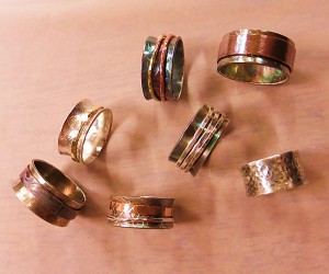 Examples of kinetic “spinner” rings created by SPC students.
