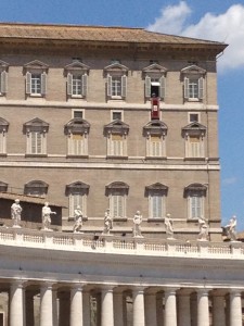 The tiny speck above the red banner is Pope Francesco addressing the masses on Sunday afternoon.