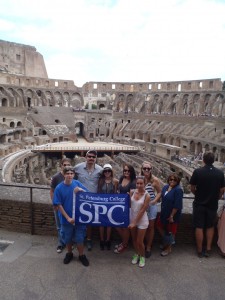Our mighty gladiators show their Titan pride at the Colosseum.