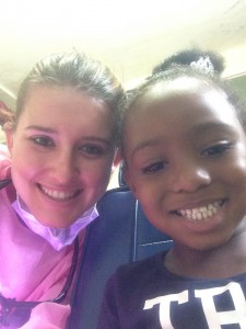 smiling child and spc student in jamaica