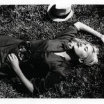 Woman laying in grass