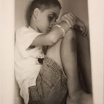 Photo of child with "believe" bracelet