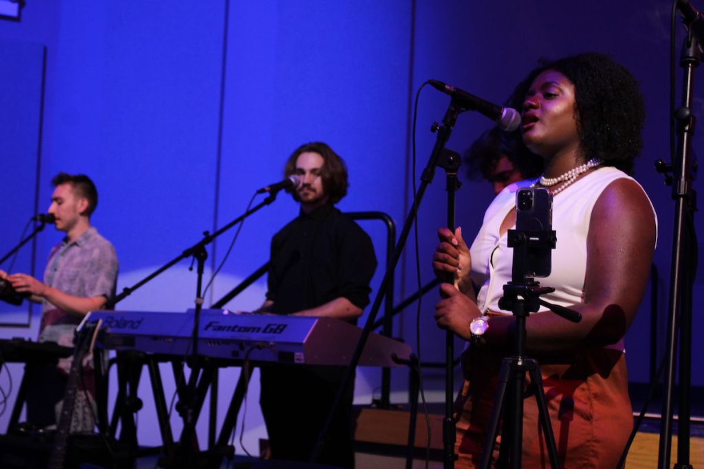 Three students from the SPC Music Department, with two vocalists and one keyboardist, perform an R & B number.