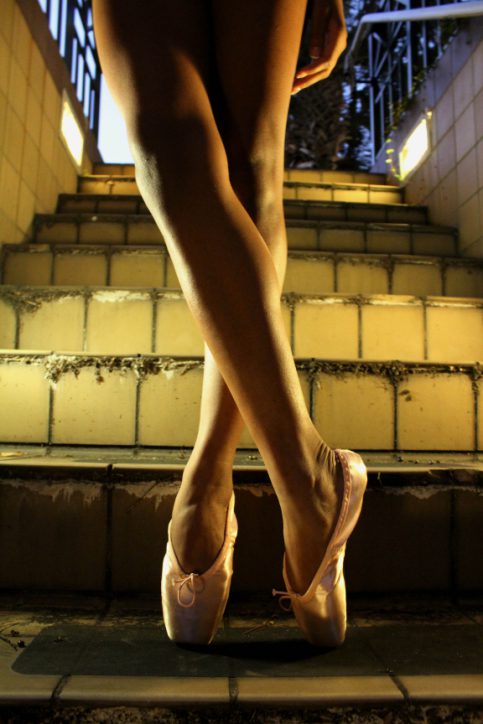 Photo of ballerina standing on toes.