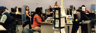 Photo of registration, student services, financial aid workers