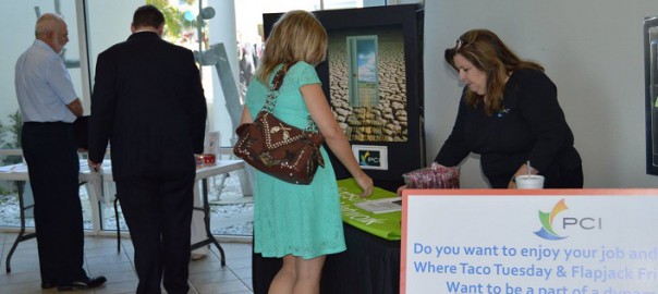 Photo of student at booth at a career fair