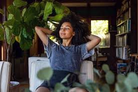 Woman breathing in deeply and relaxing