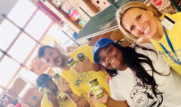 volunteers smile for pic