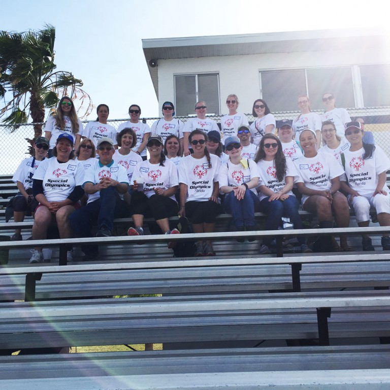 SPC student volunteers in the bleachers at the Special Olympics.