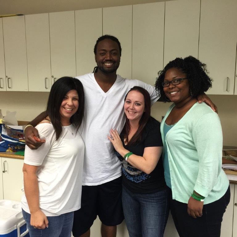 Michael Wiggs and KDP member and COE graduates, Melissa Carroll, Therese Whitehurst and Courtney Baker