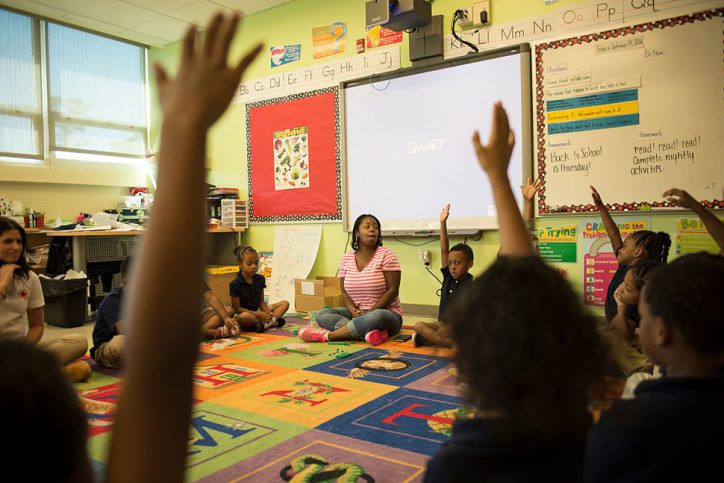 Teacher in classroom with students
