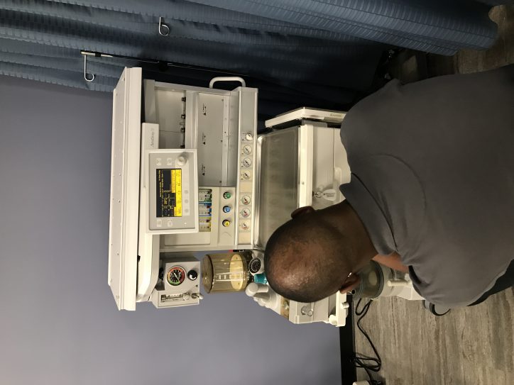 people at engineering technology open house looking at equipment