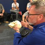 A&P Jim looking at human skull
