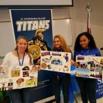 Students holding up their vision boards