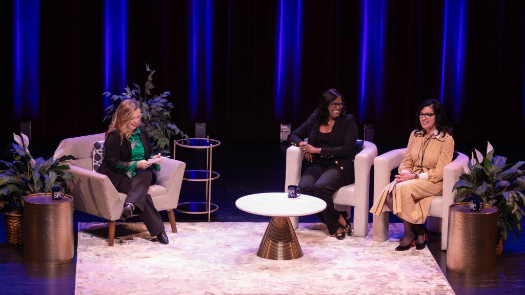 Stephanie Hayes interviews Dr. Tonjua Williams and Melissa Seixas on stage at the Palladium Theater.