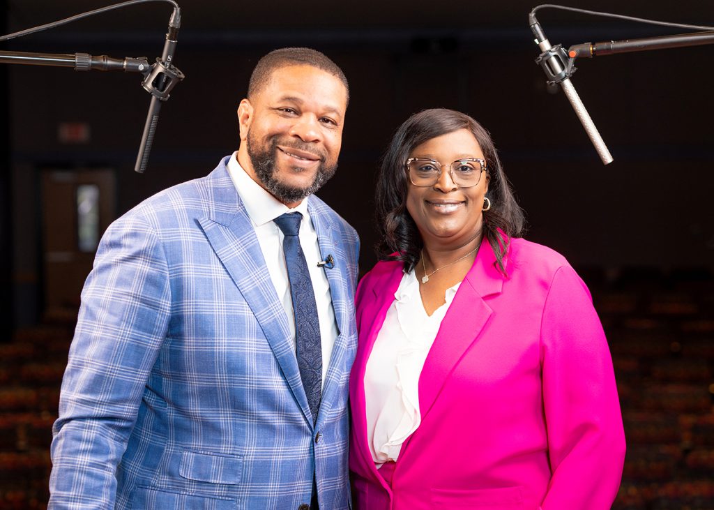 President Williams stands with podcast guest Gary Hartfield.