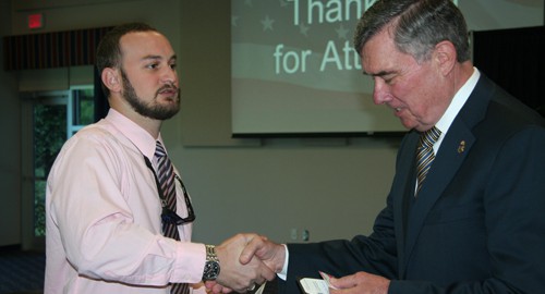 SPC Public Policy student Nicolas Louis interacting with Commissioner Kerlikowske.