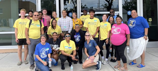 A group of SPC volunteers at the Midtown Center gathered for a group picture.