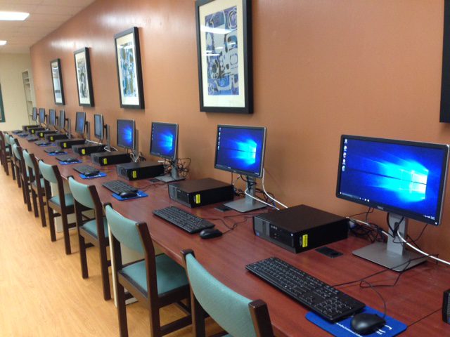 Photo of desktop computers and monitors