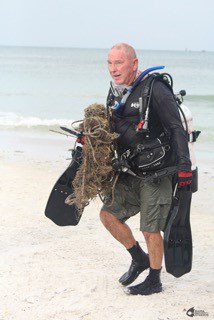 Dr. Heyward Matthews assists in the 2013 cleanup.