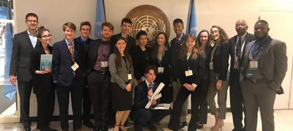 SPCs Model United Nations team members post at the United Nations during the April 2019 National Model United Nations Conference in New York City.