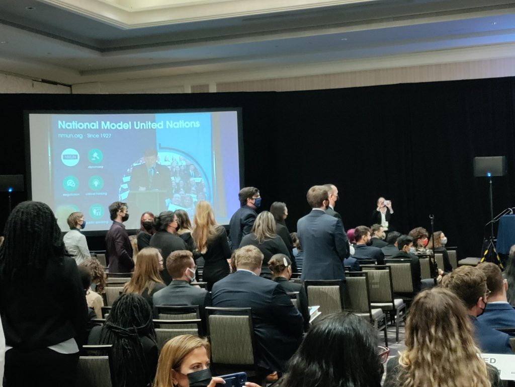model un students stand to be acknowledged