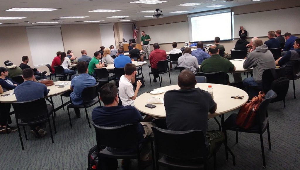 SPC students listen attentively to the guest speaker at the networking club meeting
