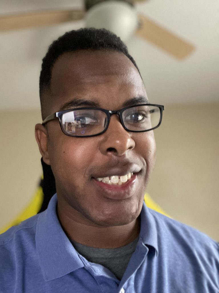 Terry Ellison in blue shirt