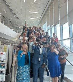 group poses on stairs
